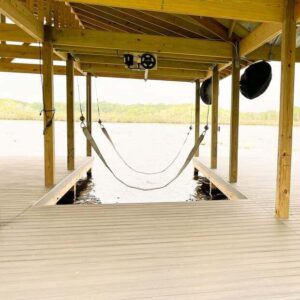 Classic sling boat lift with durable straps for secure and gentle boat support in waterfront and marina applications